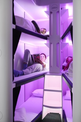 Each Skynest, infused with soothing pink light and available to economy and premium economy passengers, sleeps six passengers in streamlined high-rise bunk-beds.