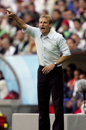Jurgen Klinsmann shouts instructions to his players during the FIFA World Cup Germany 2006 Group A match between Germany and Costa Rica.