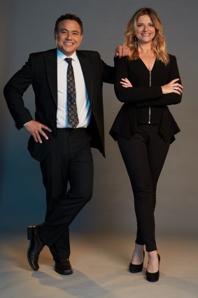 Eurovision hosts: Sam Pang and Julia Zemiro.

