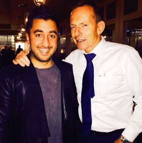 Tony Abbott with Big Brother contestant Jason Roses at a Canberra restaurant on Thursday night.