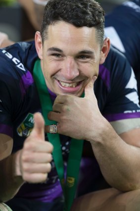Fan favourite: Billy Slater after receiving his grand final medal.