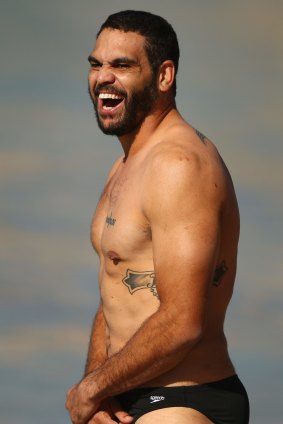 Happy man: Greg Inglis has a laugh during a Kangaroos team recovery session.