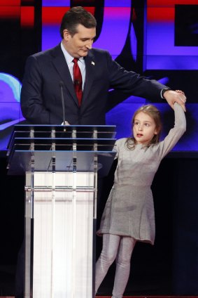 Ted Cruz stands with daughter Caroline following the CNN Republican presidential debate at The Venetian Hotel & Casino in Las Vegas.  