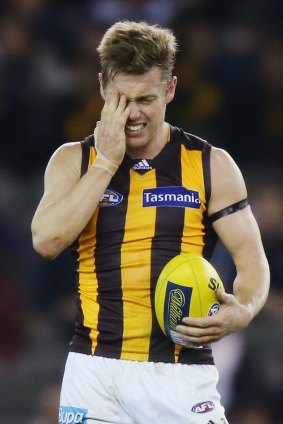 Sam Mitchell after copping a high hit.