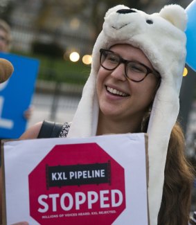 Taran Catania of Washington celebrates the rejection of the pipeline.