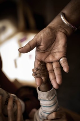 Lending a hand: Women from Fitzroy Crossing have taken a stand against the scourge of alcohol-related birth defects among young children.