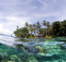 Water world ... a beach bungalow at Sanbis resort on Gizo Island.