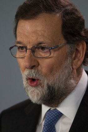 Spain's Prime Minister Mariano Rajoy makes a statement after a special Cabinet meeting at the Moncloa Palace in Madrid.