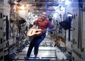 Chris Hadfield performing his zero-gravity version of David Bowie's hit "Space Oddity".