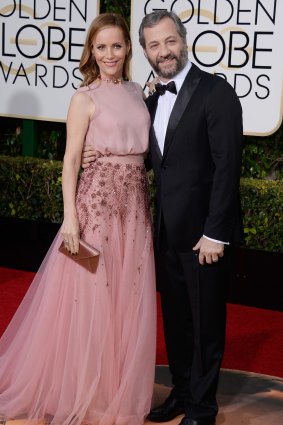 Judd Apatow, with wife actress Lesley Mann, was pitched the idea of Love by its co-stars. 