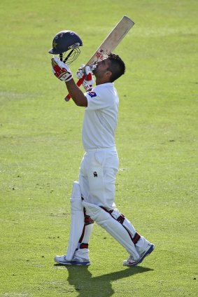 Pakistan's Ahmed Shehzad celebrates after reaching his century on the opening day of the first Test against New Zealand in Abu Dhabi.