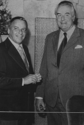 Frank Sinatra chats with then prime minister Gough Whitlam during the interval of a concert on his 1974 tour. 