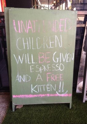 Mooney's Cafe in Hay St East - a tongue-in-cheek promise of a free kitten for unattended children.