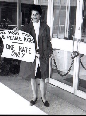 Equal pay activist Zelda D'Aprano chained to the front doors of the Commonwealth Building.
