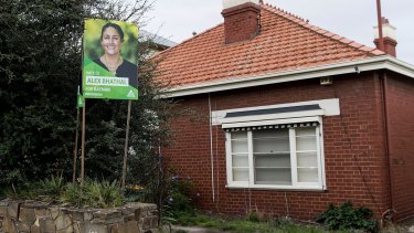 The Greens placard outside the house owned by Labor powerbroker David Feeney.