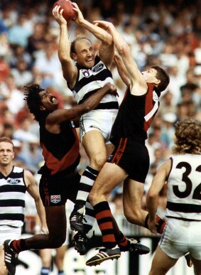 That man again: Geelong’s Gary Ablett takes a mark against Bombers Derek Kickett and Chris Daniher en route to kicking 14.7 in 1993.