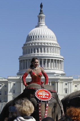 A performer riding an elephant from the Ringling Bros and Barnum & Bailey Circus in Washington, 2010.