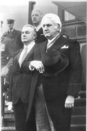 In happier times: Sir John Kerr arrives at Parliament House to be sworn in as governor-general in 1974 as prime minister Gough Whitlam looks on. 