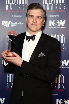 Shannon Pigram poses with the award for Best Opera in the awards room at 16th Annual Helpmann Awards.