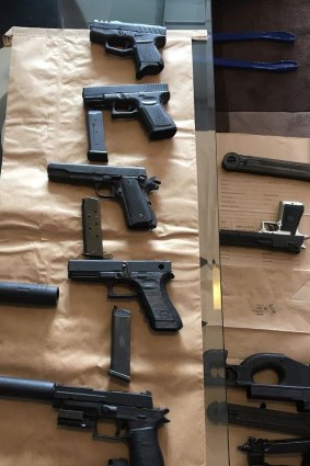 Most of the replica firearms allegedly seized by police.