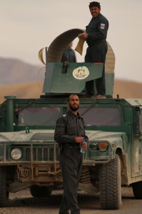 Matiullah Khan in front of his armoured Humvee on the Tarin Kowt to Kandahar highway. The former highway patrol officer charged trucks passing through his fiefdom for safe passage.