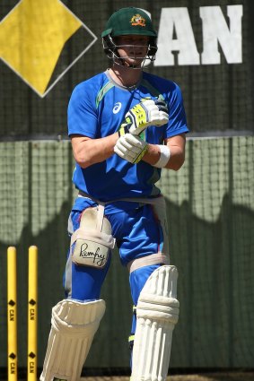 Smith pauses in the WACA nets after he was struck on the forearm.