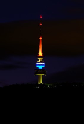 Telstra Tower on Black Mountain lit up in the colours of the French flag.