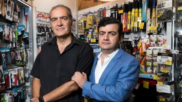 Sam Dastyari and his father Naser in his shop, King of Knives, in Queen Victoria Building, Sydney.