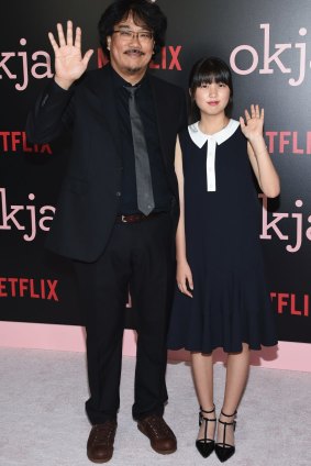 Director, co-screenwriter and producer Bong Joon Ho and actress Ahn Seo-Hyun at the premiere of Okja in New York.