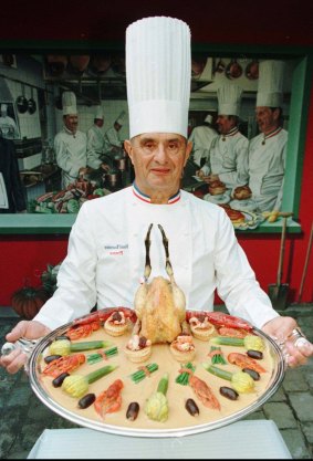 Bocuse introduces his culinary creation Coq de Bresse truffe G7 a la francaise in 1996. 