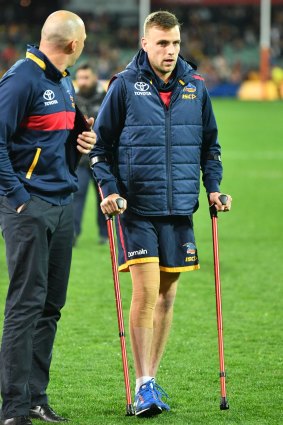 Brodie Smith of the Crows leaves the Adelaide Oval after qualifying final win over GWS.