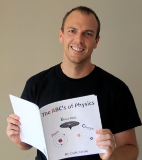 Author Chris Ferrie with one of the books he has written for kids about physics.