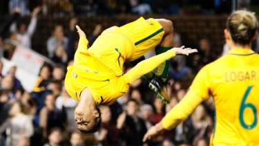 Kerr does a trademark backflip after scoring a goal during the Matildas’ 3-2 defeat of Brazil in Newcastle in September.