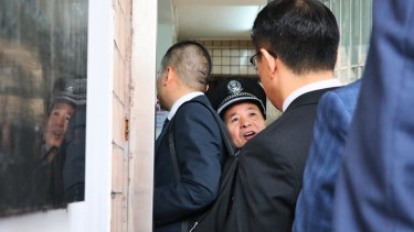 Lawyers for the accused were forced to wait for the small security door to the court and detention complex to be opened.