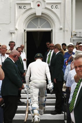 Michael Clarke of Australia leaves the ground after being dismissed on day two.