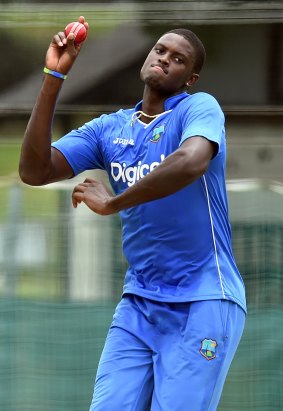 Jason Holder, the captain of the West Indies cricket team, bowls during a practice session in Brisbane.