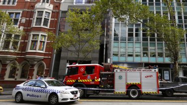Emergency services at the scene on Collins St.