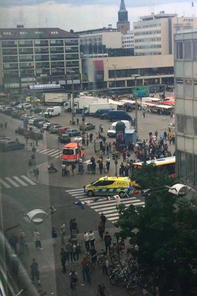 Emergency services working in Turku Market Square in Finland on Friday.