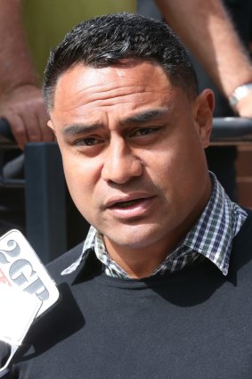 "We are truly sorry": Joe Galuvao reads a statement to the media outside the court. 