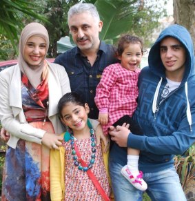 Ahmed Abou-eid, back centre, with his family (left to right) Salma, Isra, Yasmin and Aladdin.
