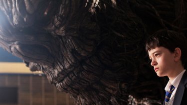 Conor (Lewis MacDougall) and the monster (voiced by Liam Neeson) in A Monster Calls.