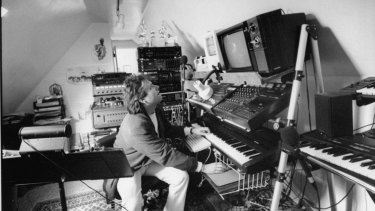 Alan Menken at his electric piano and computer in his home studio in late 1991 