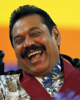 Sri Lankan incumbent President Mahinda Rajapaksa looks relaxed at his final election rally on Monday.