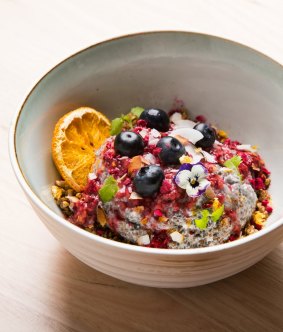 Chia pudding with freeze-dried raspberries, maple buckwheat and fruit.