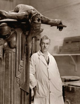 Portrait of sculptor Rayner Hoff in his studio with <i>The Sacrifice</i>.