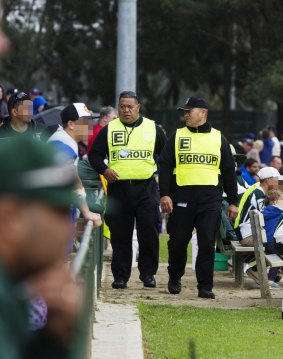 Security guards Tonga Koli and Itilani Latu patrolling the Penrith and districts Junior Rugby League matches.