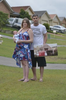 "The court has ruled we are eligible for a refund": Melanie and Mitchell Buscombe with their baby.