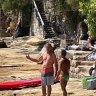  A woman has been attacked by a shark at Gunyah Beach and suffered a serious leg injury.