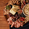 Aged cheddar dip and charcuterie grazing board. Take a dip.
