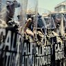 Protesters confront a line of the California National Guard in downtown Los Angeles on Sunday.